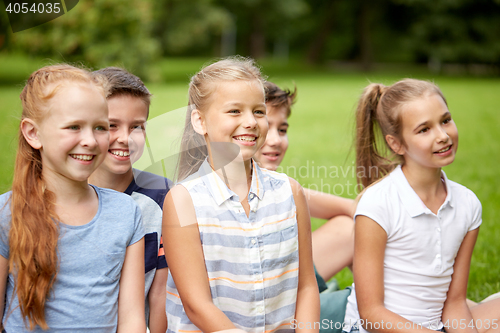 Image of group of happy kids or friends outdoors