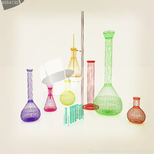 Image of Chemistry set, with test tubes, and beakers filled with colored 