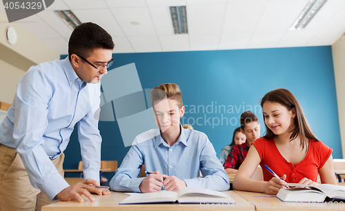 Image of group of students and teacher at school classroom