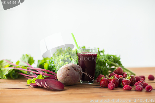 Image of glass of beetroot juice, fruits and vegetables