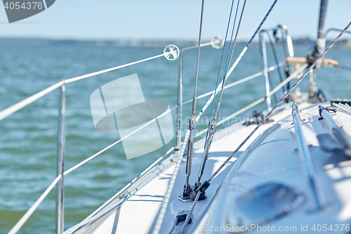 Image of close up of sailboat or sailing yacht deck in sea