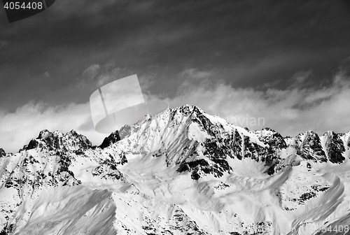 Image of Black and white snow mountains in winter sun day and sky with cl