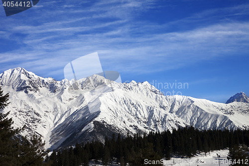 Image of Winter mountains and ski slope at sun winter day