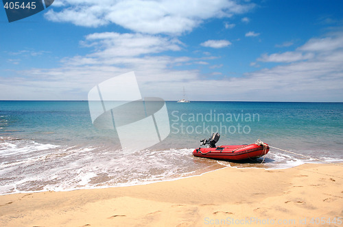 Image of A dingy on the beach