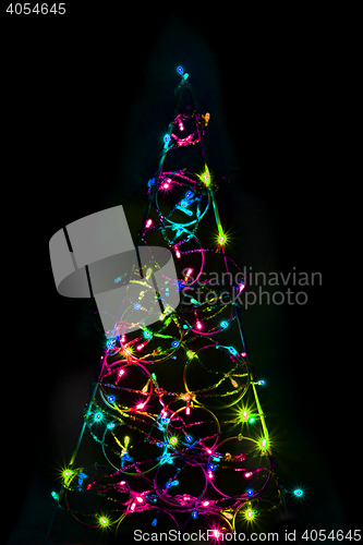 Image of christmas tree form the color xmas lights