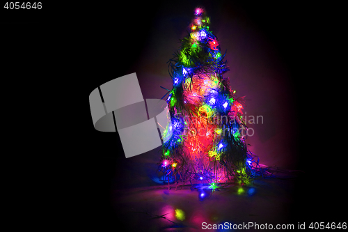 Image of christmas tree form the color xmas lights