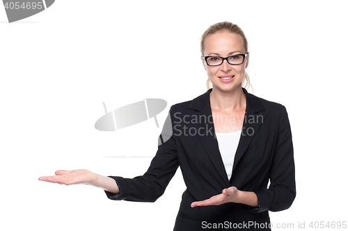 Image of Business woman showing hand sign to side.