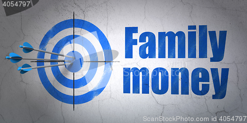 Image of Currency concept: target and Family Money on wall background