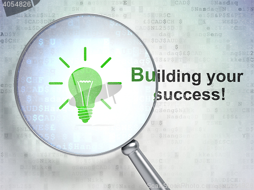Image of Business concept: Light Bulb and Building your Success! with optical glass