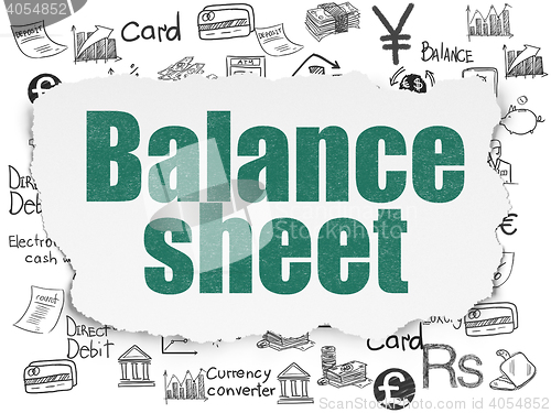 Image of Money concept: Balance Sheet on Torn Paper background