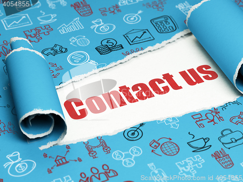 Image of Business concept: red text Contact us under the piece of  torn paper