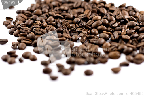 Image of coffee beans isolated on white background, shallow depth of fiel