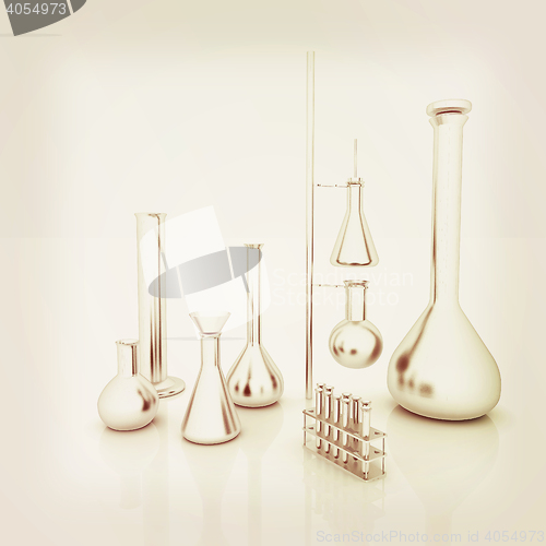 Image of Chemistry set, with test tubes, and beakers filled with colored 