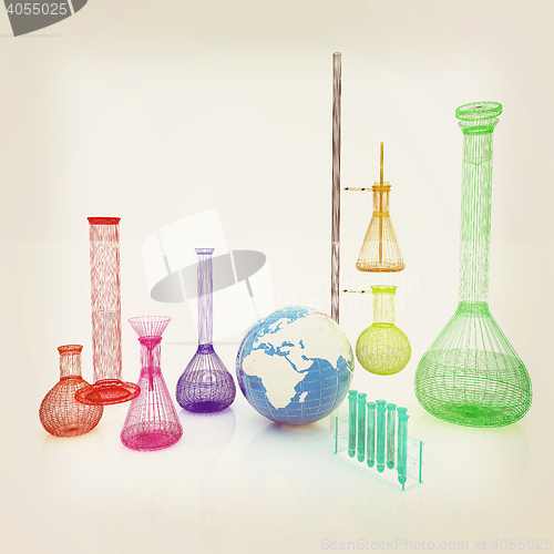 Image of Chemistry set, with test tubes, and beakers filled with colored 