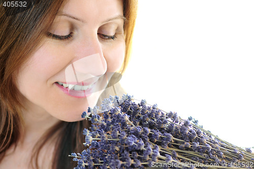 Image of Woman smelling lavender