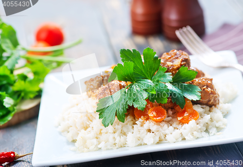 Image of boiled rice with sauce