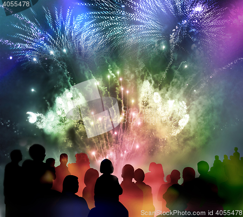 Image of bright sparkling fireworks and illustrated spectator silhouettes