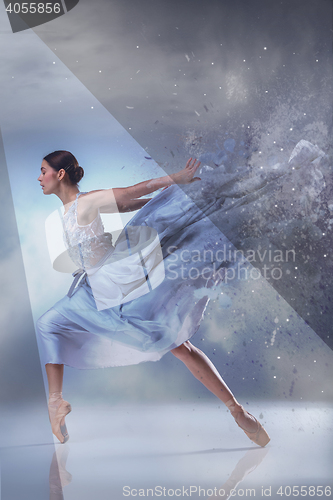Image of The beautiful ballerina dancing in blue long dress 
