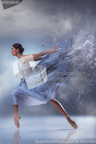 Image of The beautiful ballerina dancing in blue long dress 