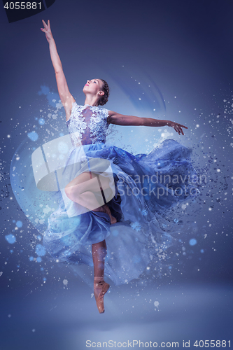 Image of The beautiful ballerina dancing in blue long dress 