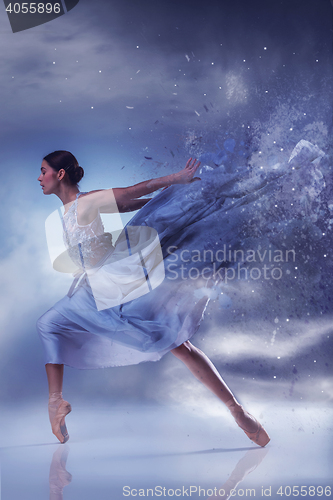 Image of The beautiful ballerina dancing in blue long dress 