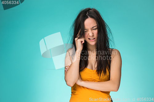 Image of Frustrated young woman having a bad hair