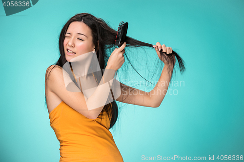 Image of Frustrated young woman having a bad hair