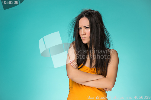 Image of Frustrated young woman having a bad hair