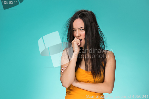 Image of Frustrated young woman having a bad hair