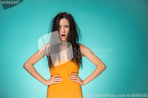 Image of Frustrated young woman having a bad hair