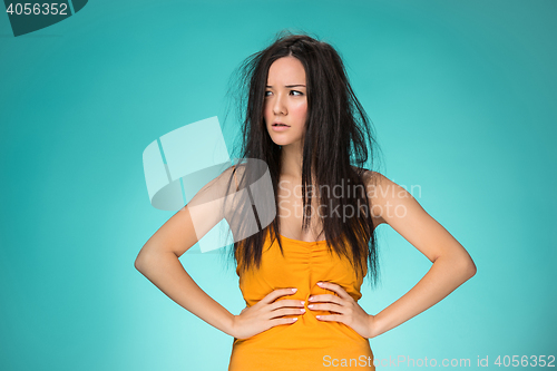 Image of Frustrated young woman having a bad hair