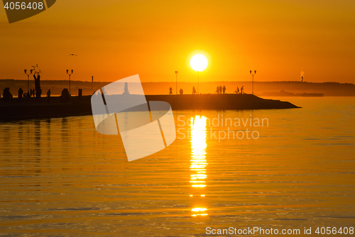 Image of Hot orange sundown on lake