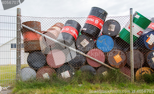 Image of AKRANES, ICELAND - AUGUST 1, 2016: Oil barrels or chemical drums