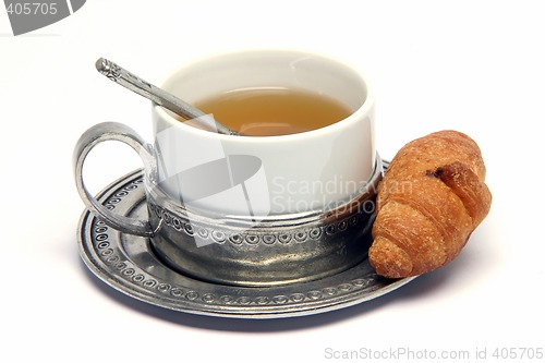 Image of tea cup and croisant