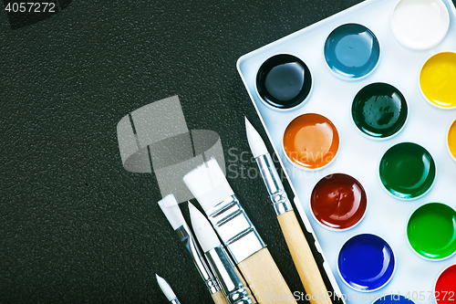 Image of paint and brushes