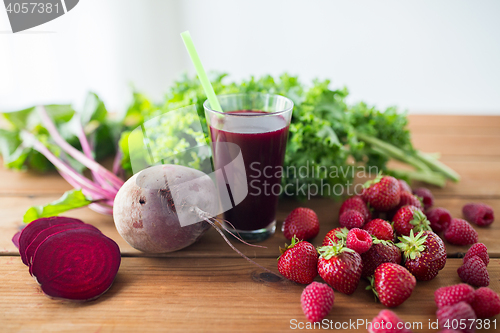 Image of glass of beetroot juice, fruits and vegetables