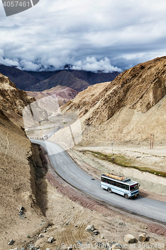 Image of Indian passenger bus on highway in Himalayas. Ladakh, India