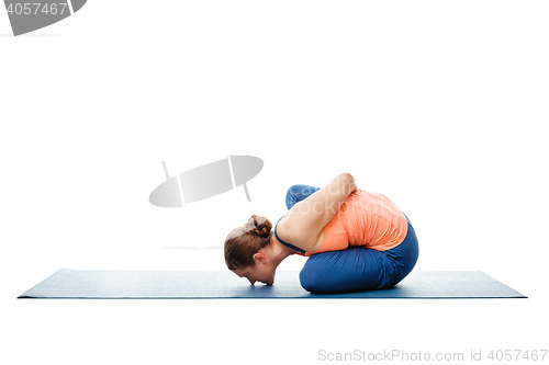 Image of Woman doing Ashtanga Vinyasa Yoga asana Marichyasana B