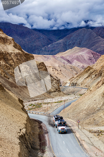 Image of Indian lorry trucks on highway in Himalayas. Ladakh, India