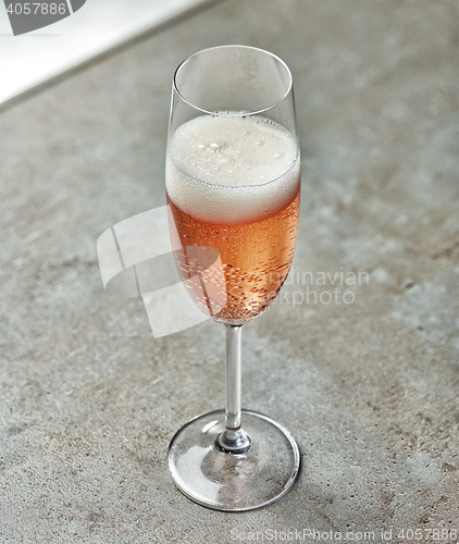 Image of glass of pink champagne