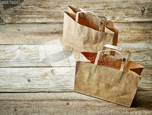 Image of two brown paper shopping bags