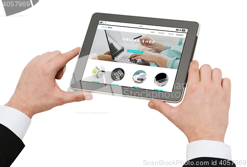 Image of close up of hands holding tablet pc with