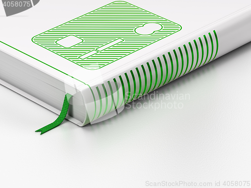 Image of Money concept: closed book, Credit Card on white background
