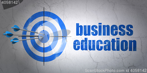 Image of Learning concept: target and Business Education on wall background