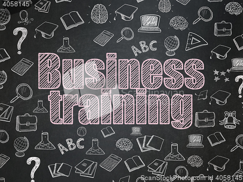 Image of Learning concept: Business Training on School board background