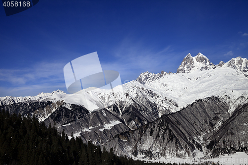 Image of Snow mountains in winter at sunny day