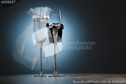 Image of Decorated wedding champagne glasses