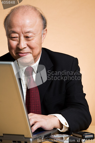 Image of Senior asian businessman