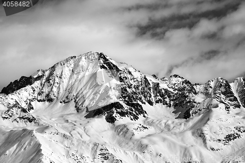 Image of Black and white winter snow mountains at nice sun day