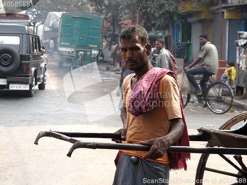 Image of Streets of Kolkata. Portrait of a rickshaw driver